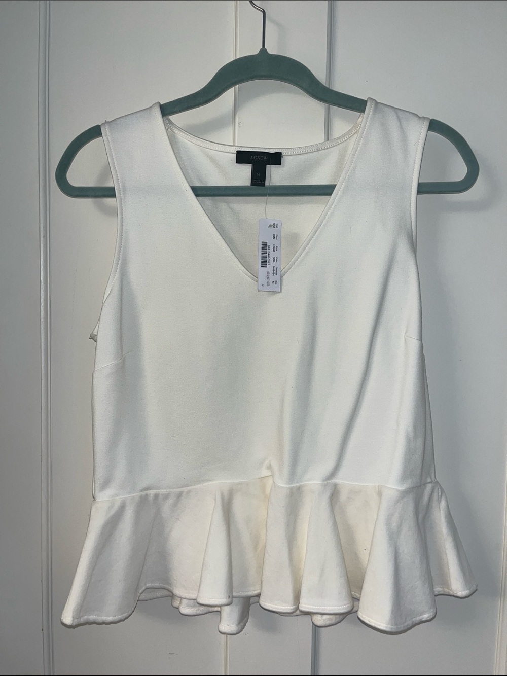 J. Crew Ivory Sleeveless V-Neck Peplum Top